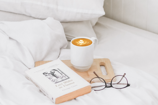 Book, Latte, And Glasses On Bed