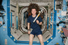 Woman Astronaut Floating In Space
